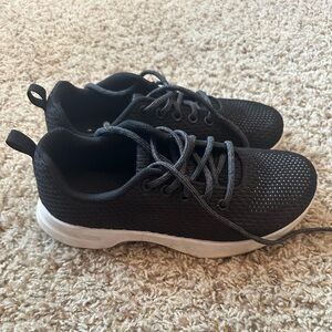 Walmart brand tennis shoes.